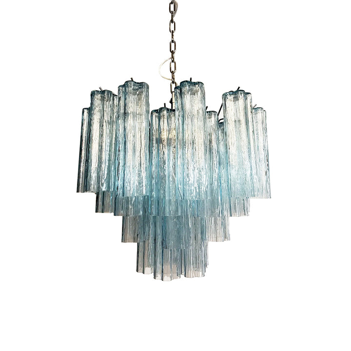 Murano Star Tube Chandelier with red-pink gradient glass on a plain white wall