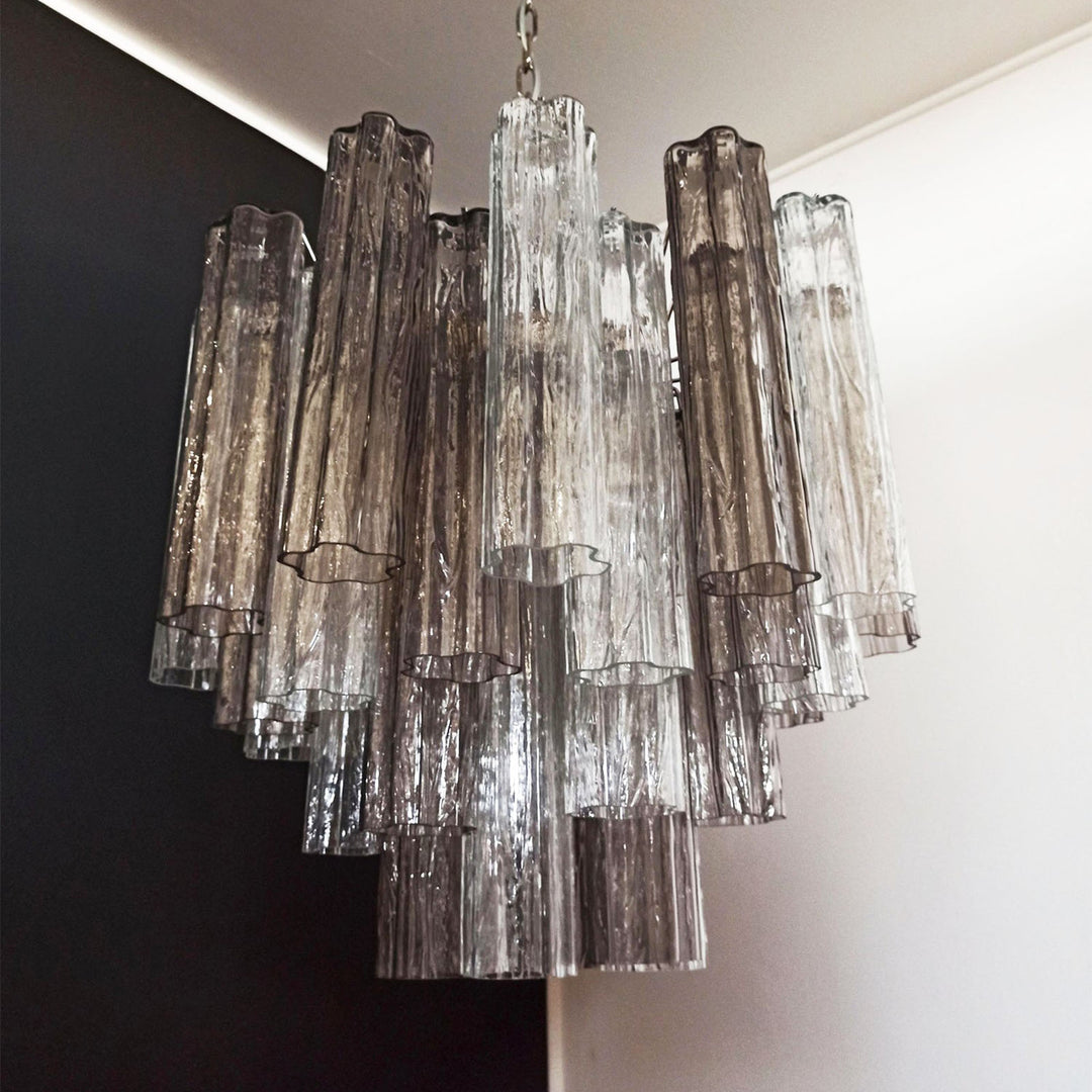 Murano Star Tube Chandelier with smoke gray glass tubes in a dark room corner view