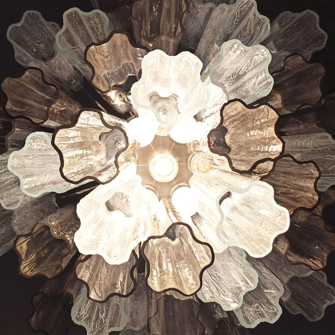 Top view of Murano Star Tube Chandelier with smoke gray star-shaped glass elements on white background
