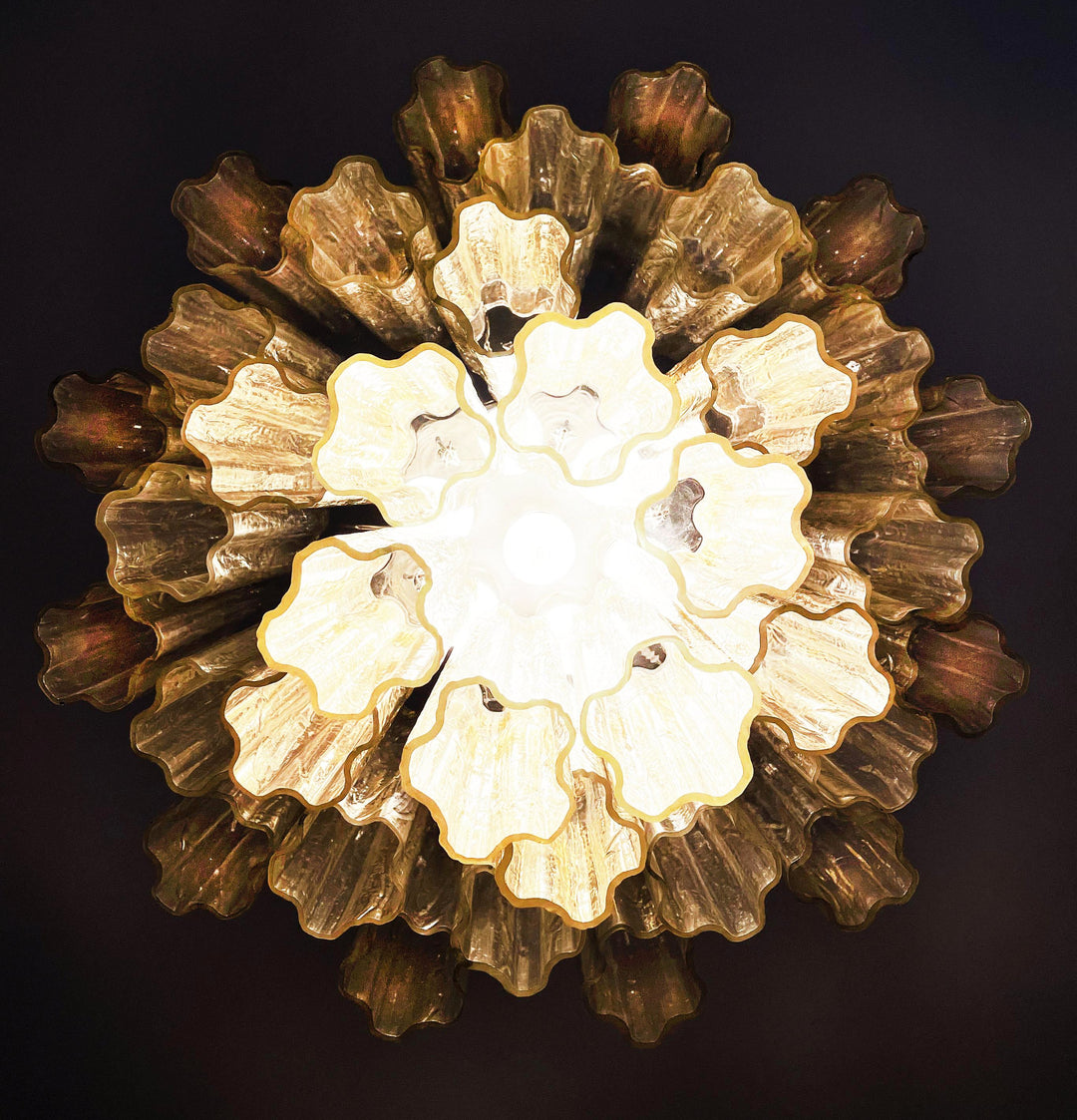 Top view of Murano Star Tube Chandelier with smoke gray star-shaped glass elements on white background