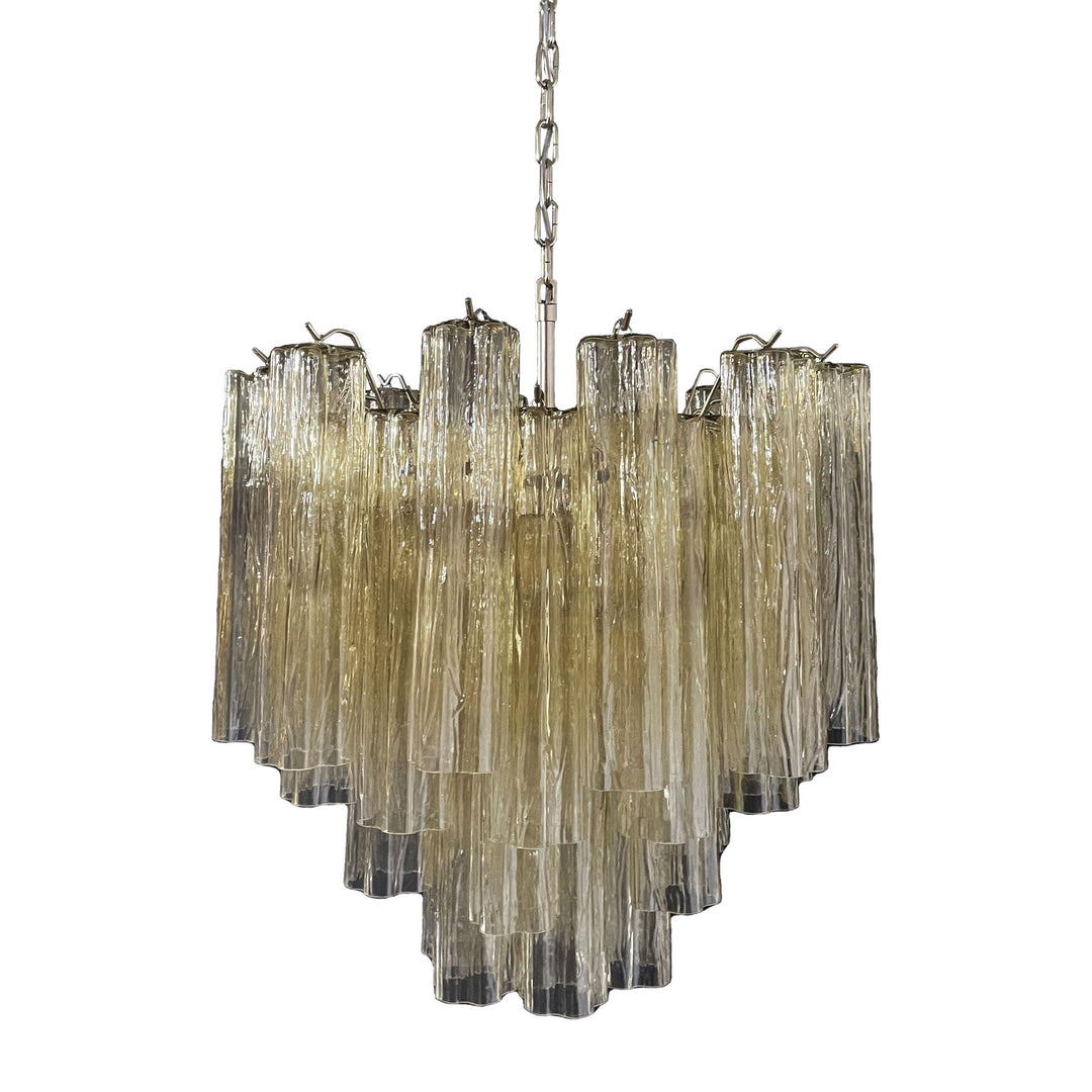Murano Star Tube Chandelier with turquoise blue glass on a plain white wall