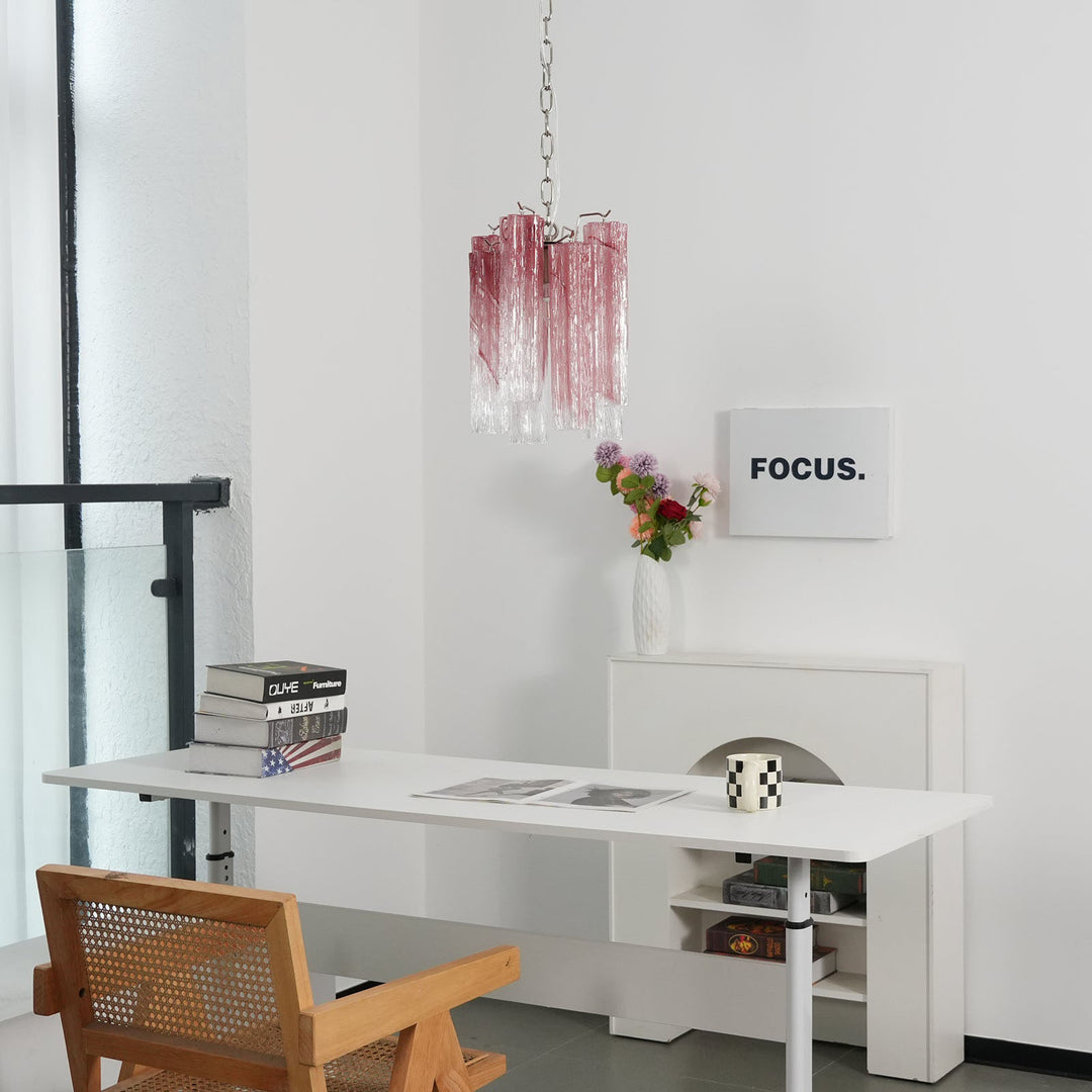 Murano Tubes Glass Chandelier with pink gradient glass hanging above a desk with a wooden chair