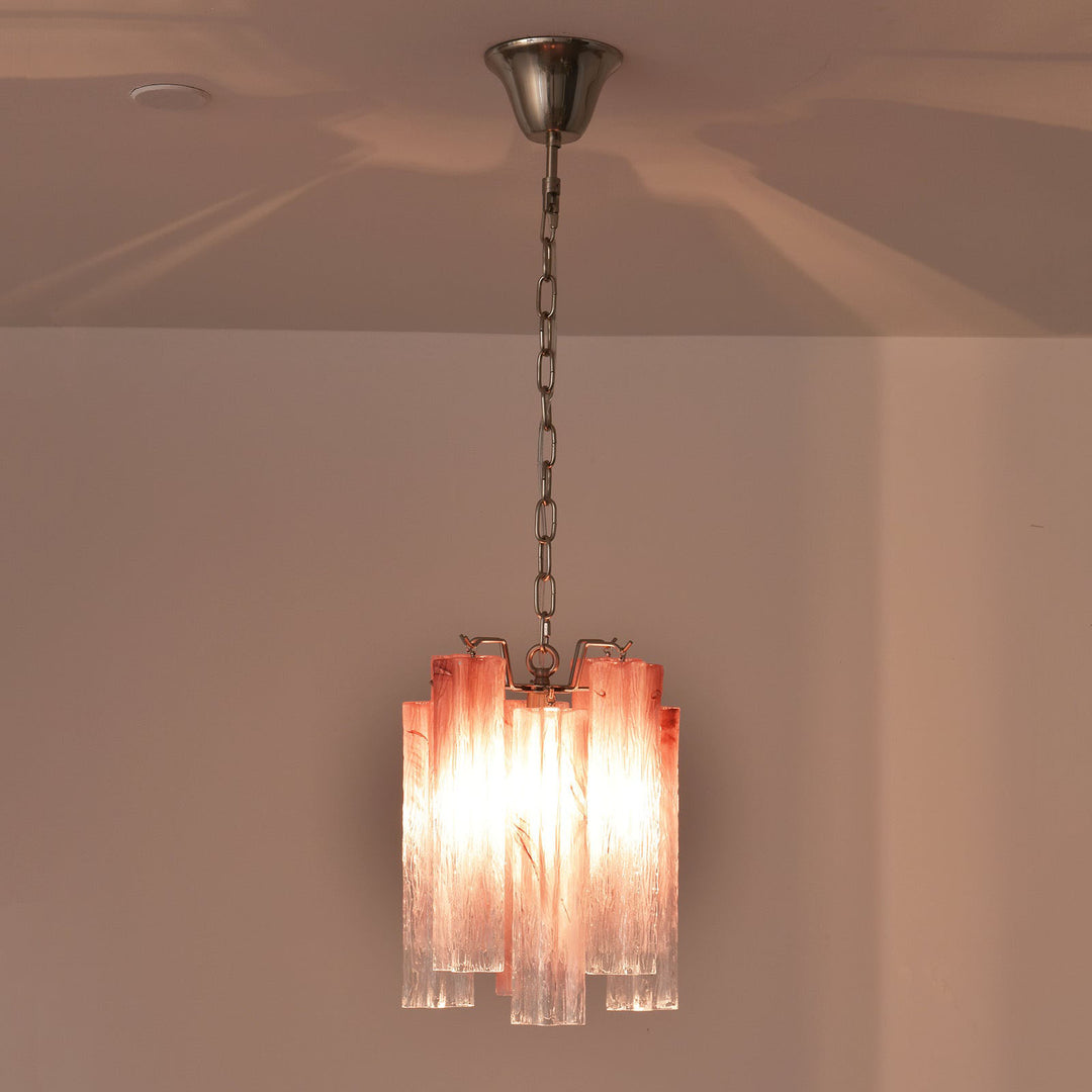 Murano Tubes Glass Chandelier with pink gradient glass hanging from a ceiling with warm light