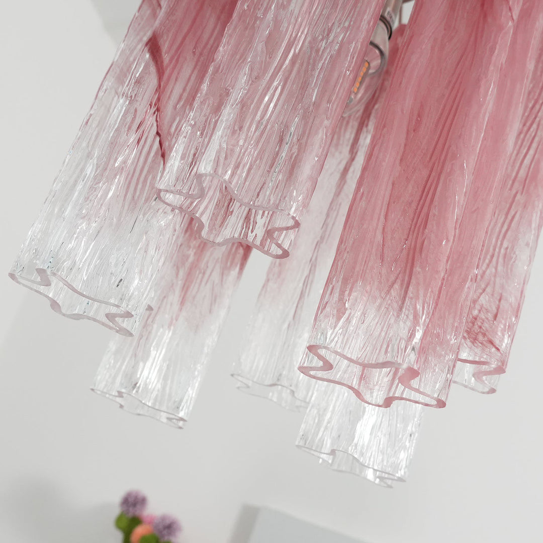 Close-up of the pink gradient glass tubes showing their rippled texture