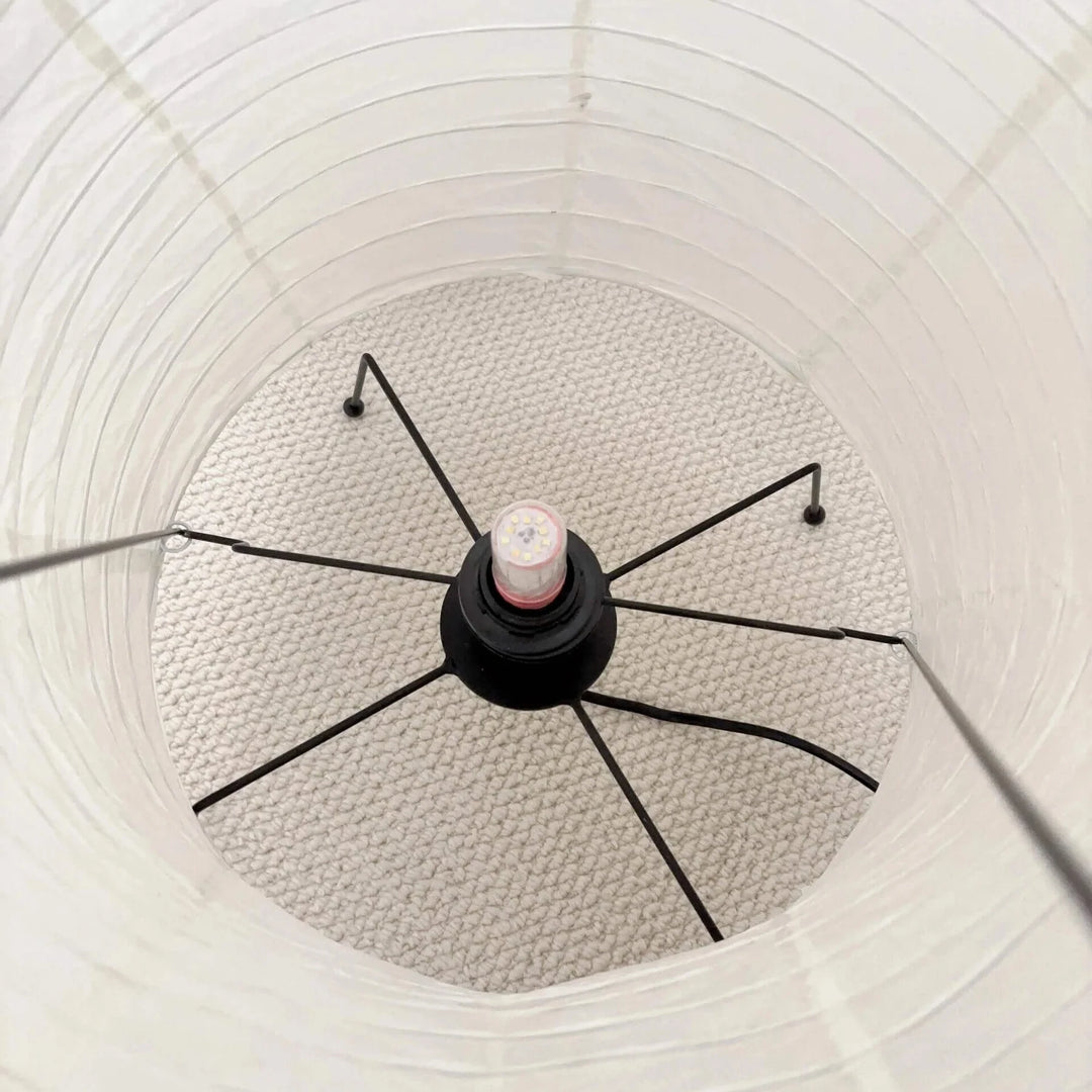 Close-up of the internal wire frame and spider fitting of the paper lamp