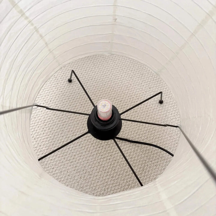 Close-up of the internal wire frame and spider fitting of the paper lamp