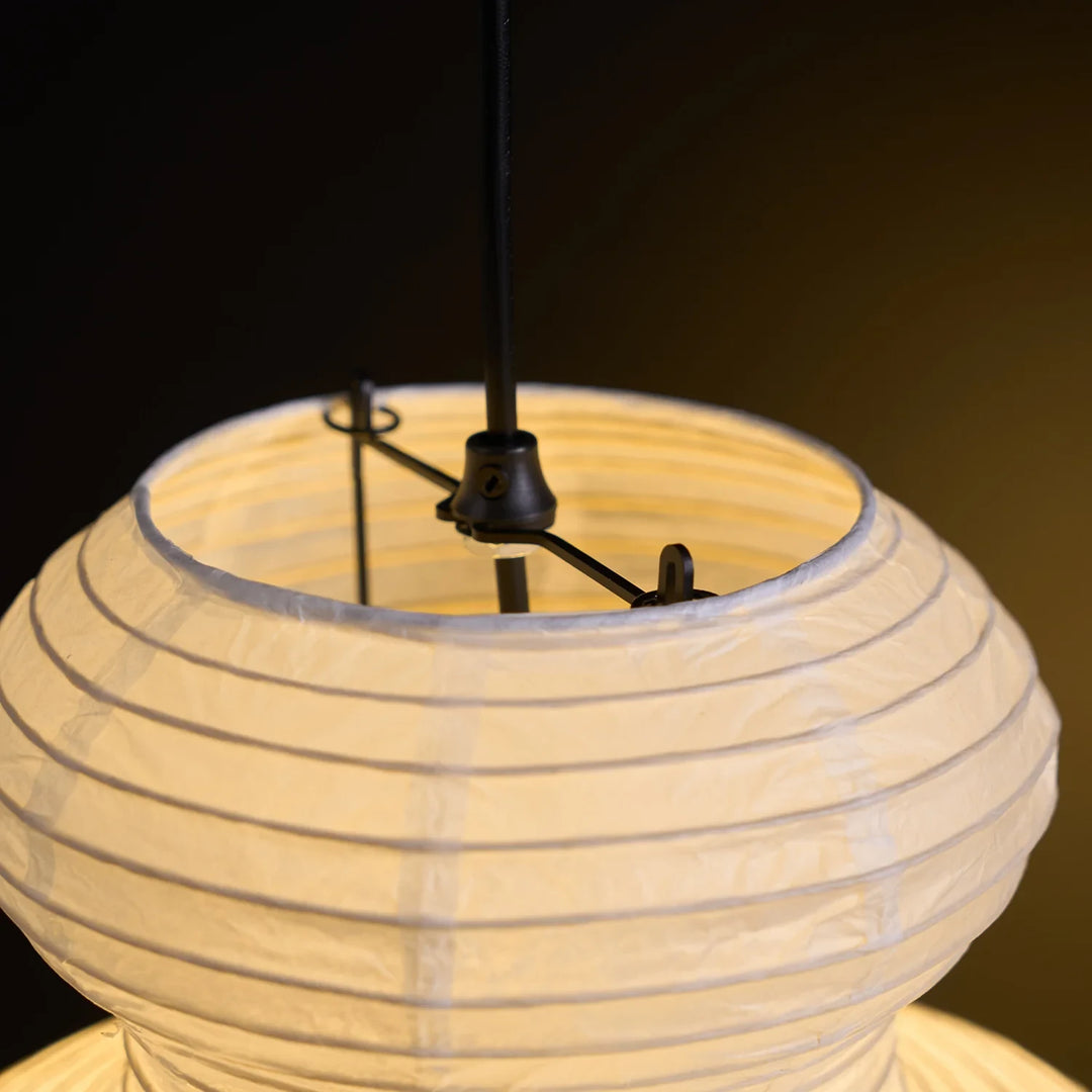 Close-up of the inner frame and socket fitting inside the paper pendant