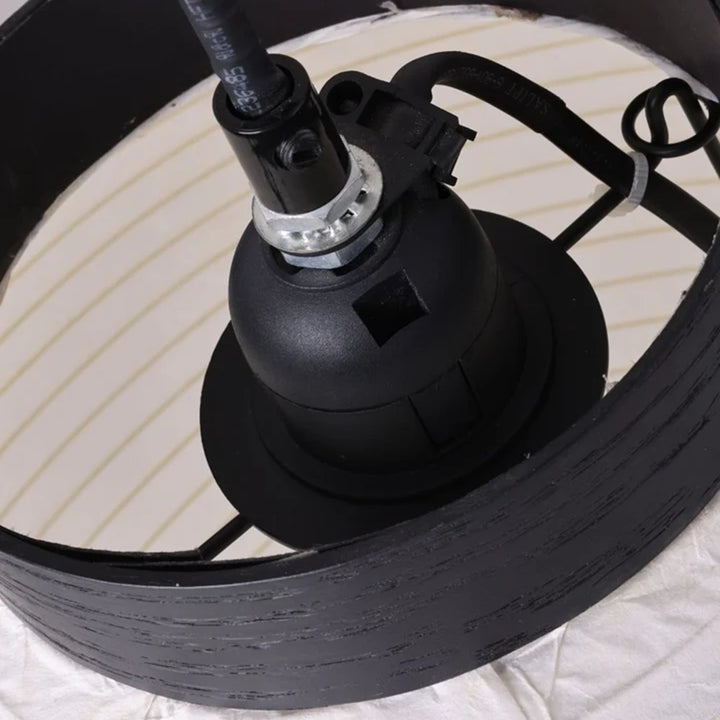 Detail of the lamp holder and internal fitting inside the upper paper shade