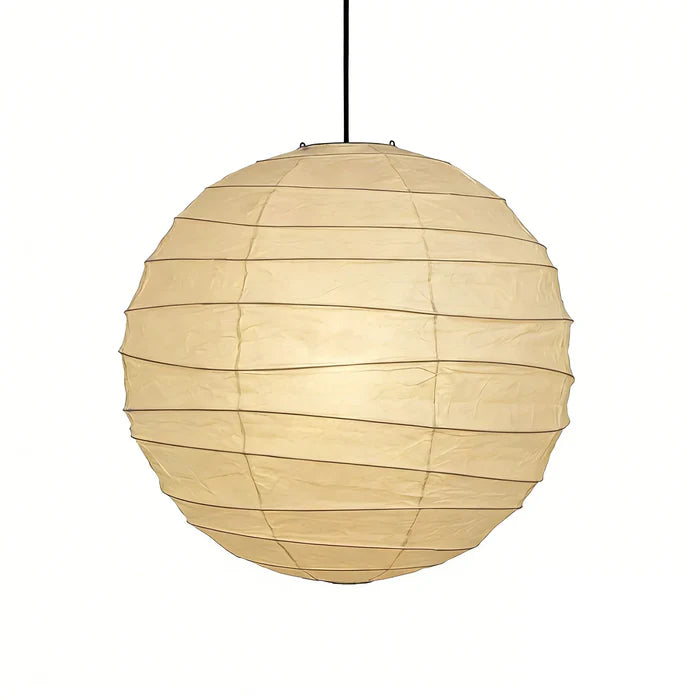 Single paper globe pendant on a black cord photographed against white
