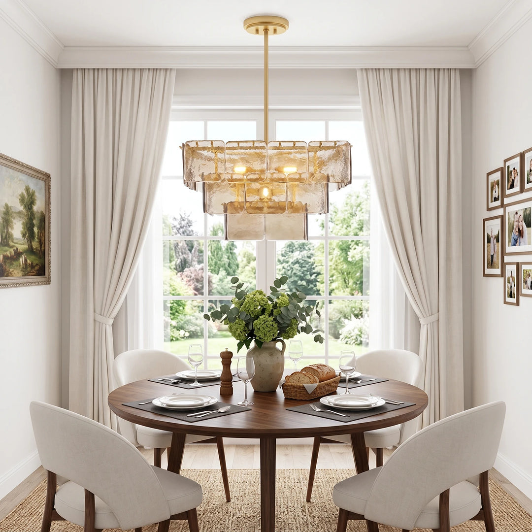 Tiered glass chandelier above a round table set in a bright bay window
