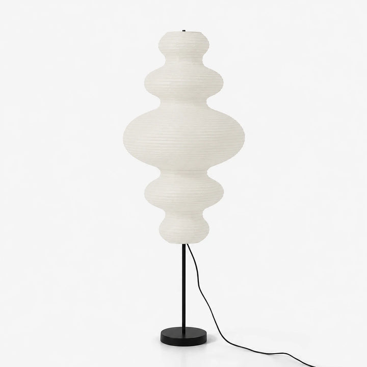 Tiered gourd-shaped mulberry paper floor lamp on a black disc base against a white background