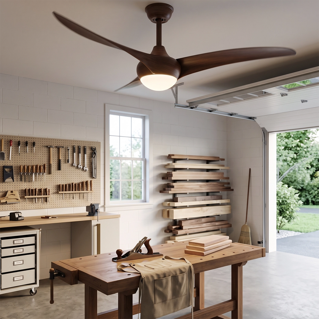 Walnut ceiling fan with light above a work table in a bright craft studio
