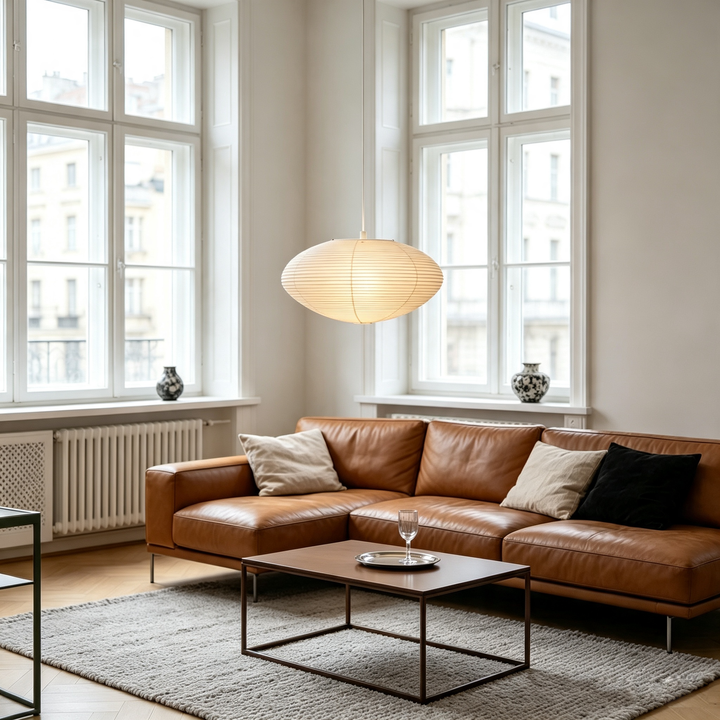 Washi paper oval pendant light in european style living room with vintage brown leather sectional sofa
