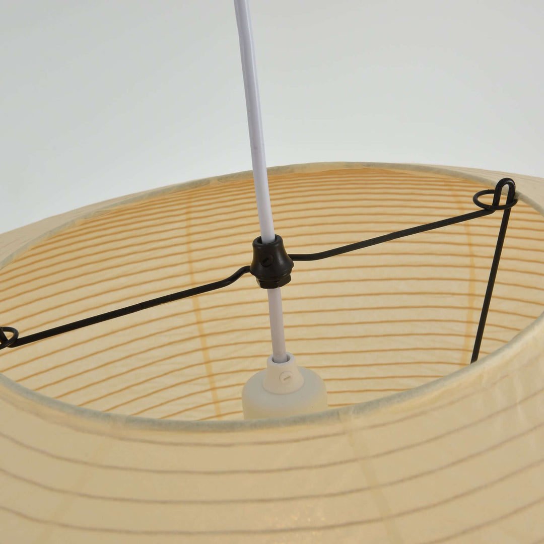 Inside view of oval washi paper pendant lamp, showing internal metal support frame and lamp holder structure