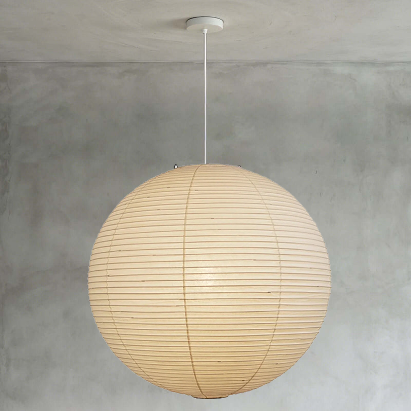 Living room interior with two matching size washi paper spherical pendants layered together