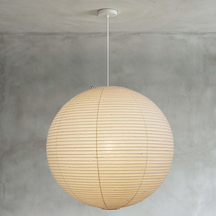 Living room interior with two matching size washi paper spherical pendants layered together
