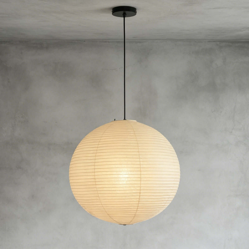 Washi paper sphere pendant with silver metal chain mounted on plain grey ceiling